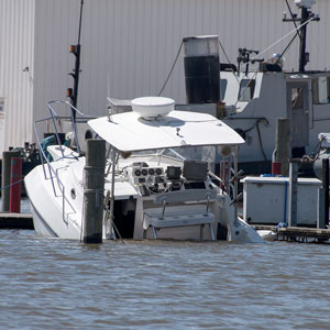 A boat ruin in water - Your Injury Law Group